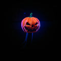 3D printed orange jack-o'-lantern pumpkin tow hitch cover on a truck hitch — lifestyle shot