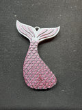 3D printed mermaid tail soda can opener in pink with detailed scale texture