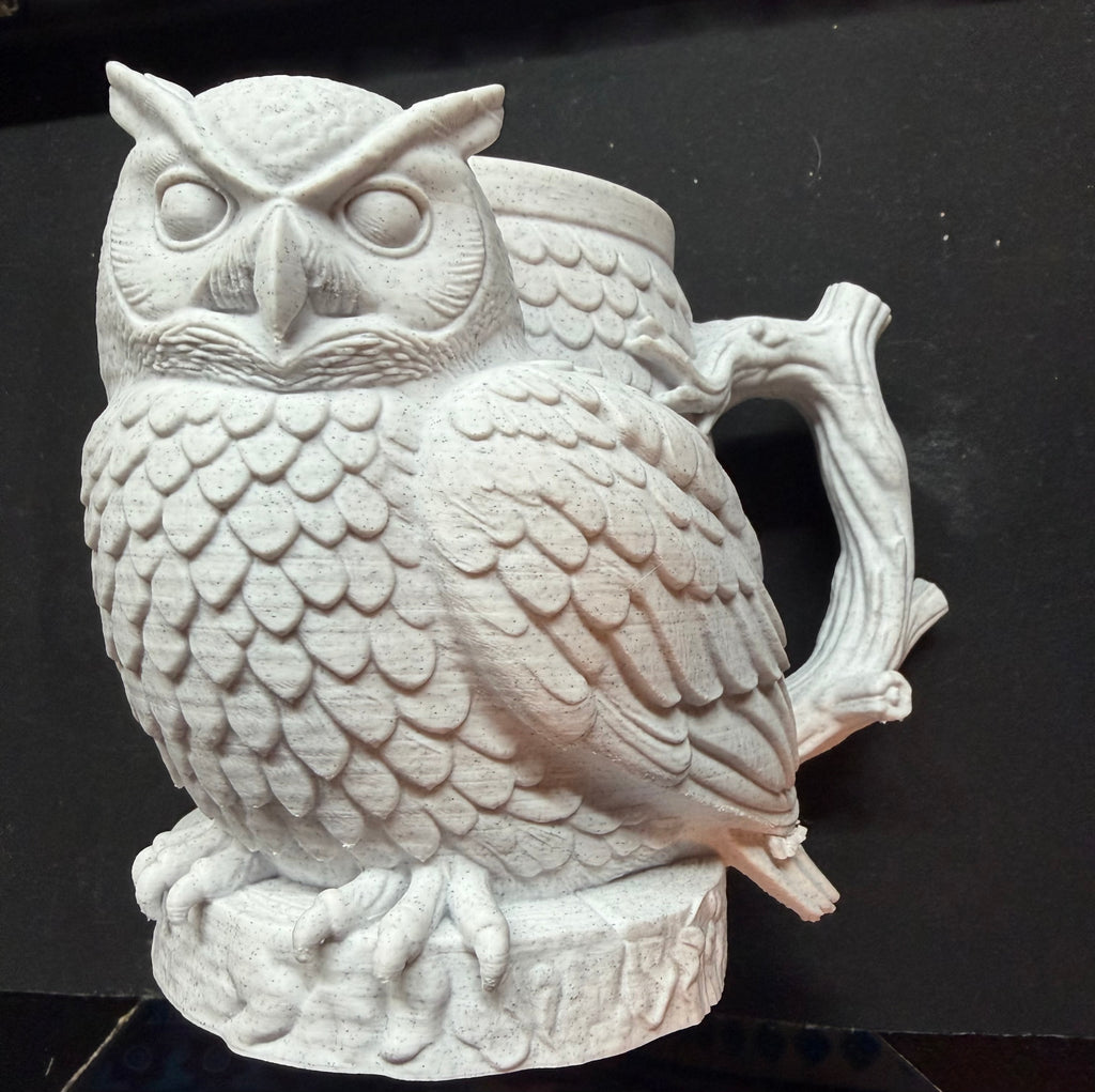 Top-down view of 3D printed owl can holder showing the open interior that fits a 12 fl oz can