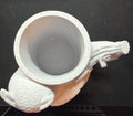 3D printed owl can holder front view showing detailed face, feathers, and branch handle