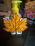 3D printed maple leaf BBW soap cover on soap bottle - amber and copper