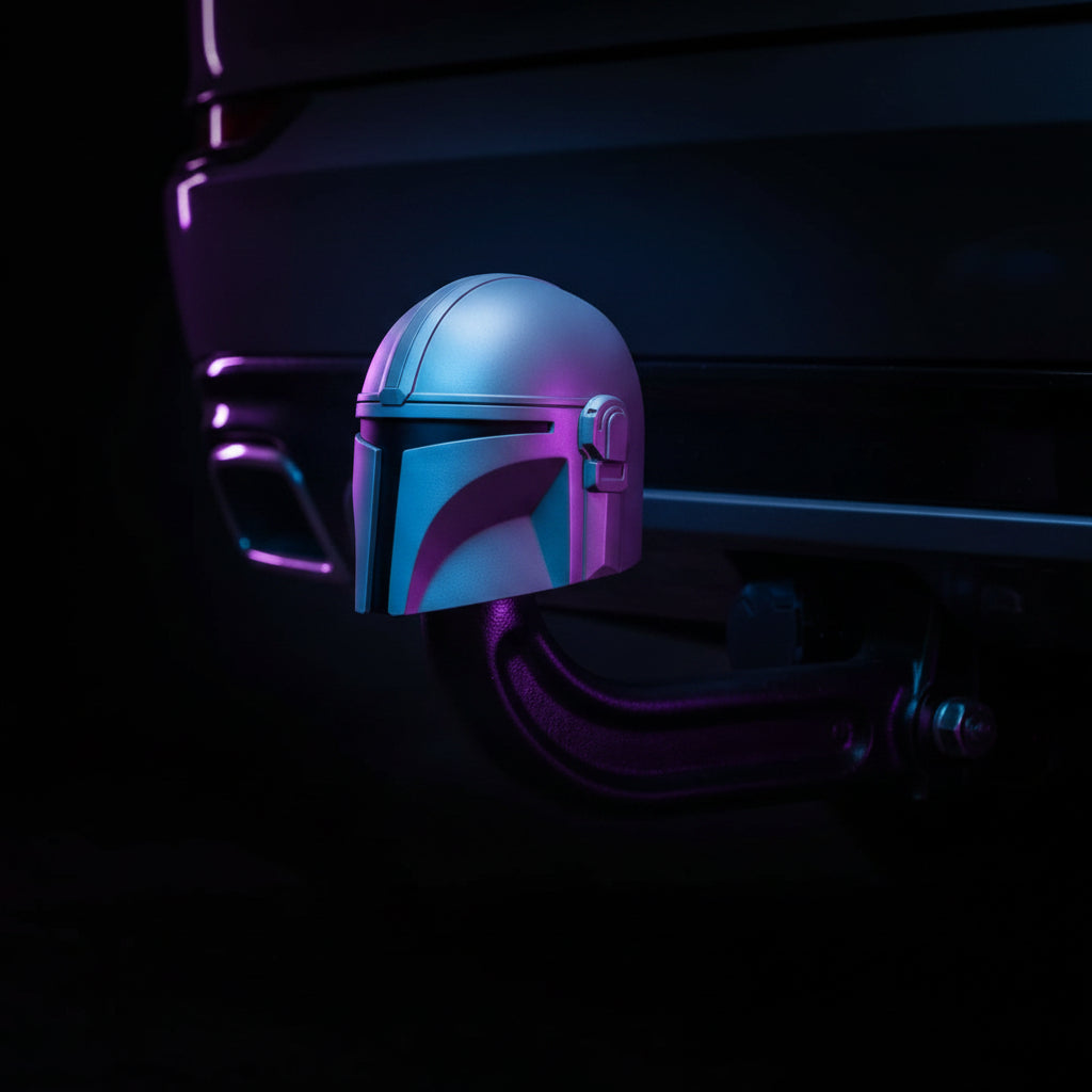 3D printed Mandalorian helmet tow hitch cover front view on table